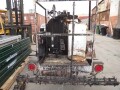 tar-machine-on-a-trailer-small-2