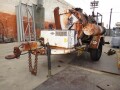 tar-machine-on-a-trailer-small-0