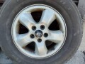 original-16-inch-aluminum-hyundai-wheels-with-old-tires-small-6