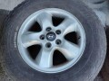 original-16-inch-aluminum-hyundai-wheels-with-old-tires-small-5