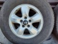 original-16-inch-aluminum-hyundai-wheels-with-old-tires-small-4