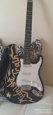 electric-guitar-desk-2-small-sofas-jewelry-bag-jewelry-big-1