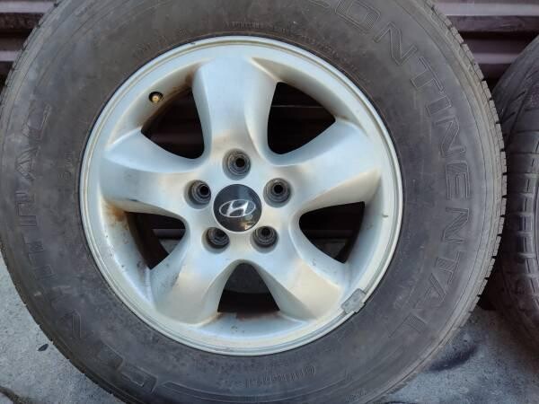 original-16-inch-aluminum-hyundai-wheels-with-old-tires-big-4