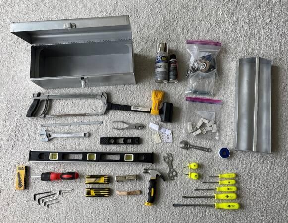 complete-set-of-tools-screwdrivers-hammer-hacksaw-wrenches-big-2
